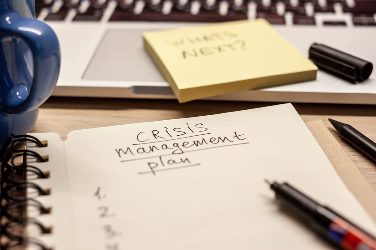 crisis management plan on notebook